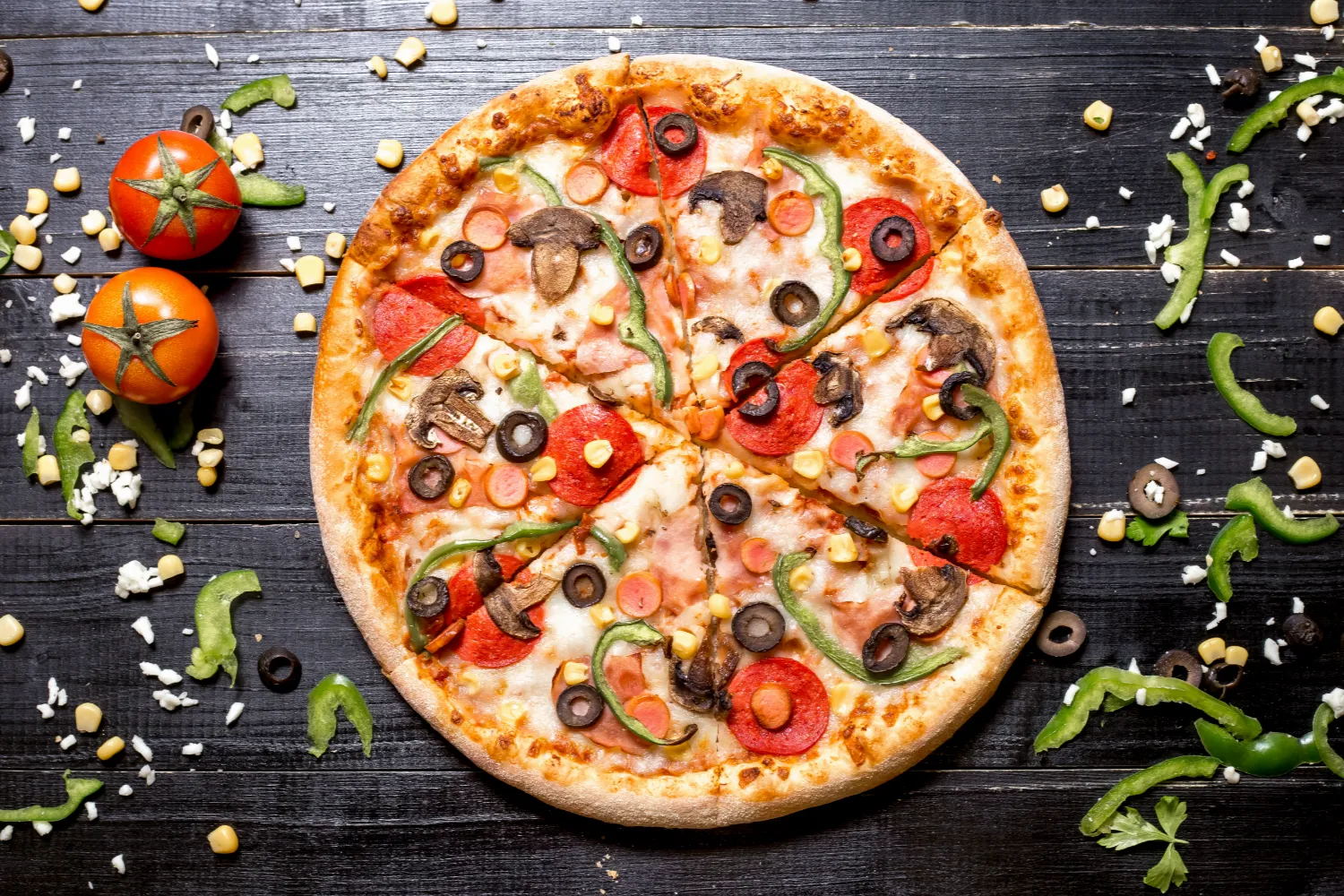 top-view-pepperoni-pizza-with-mushroom-sausages-bell-pepper-olive-corn-black-wooden