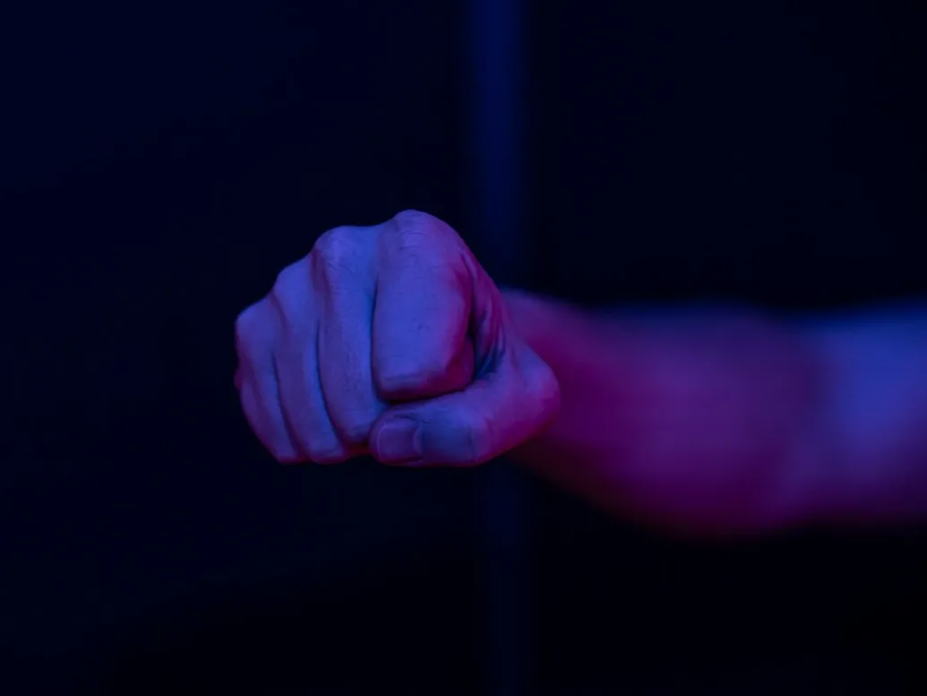 male-clenched-fist-blurred-wall_169016-11003
