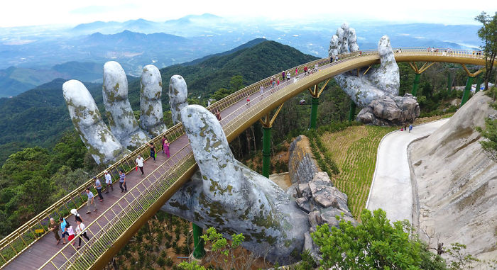newsexaminer-nuotr-creative-design-giant-hands-bridge-ba-na-hills-vietnam-5b5ec9f07c1d1-700.jpg