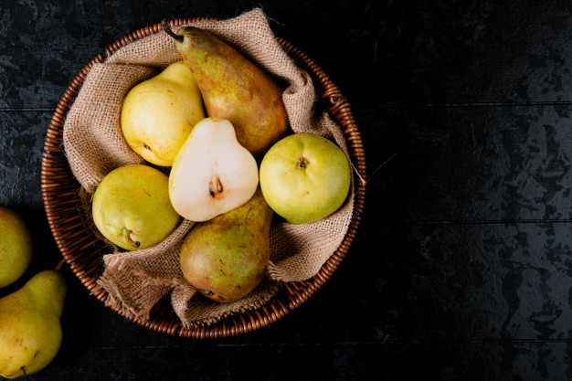 top-view-fresh-ripe-pears-wicker-basket-black-background-with-copy-space-141793-7744.jpg