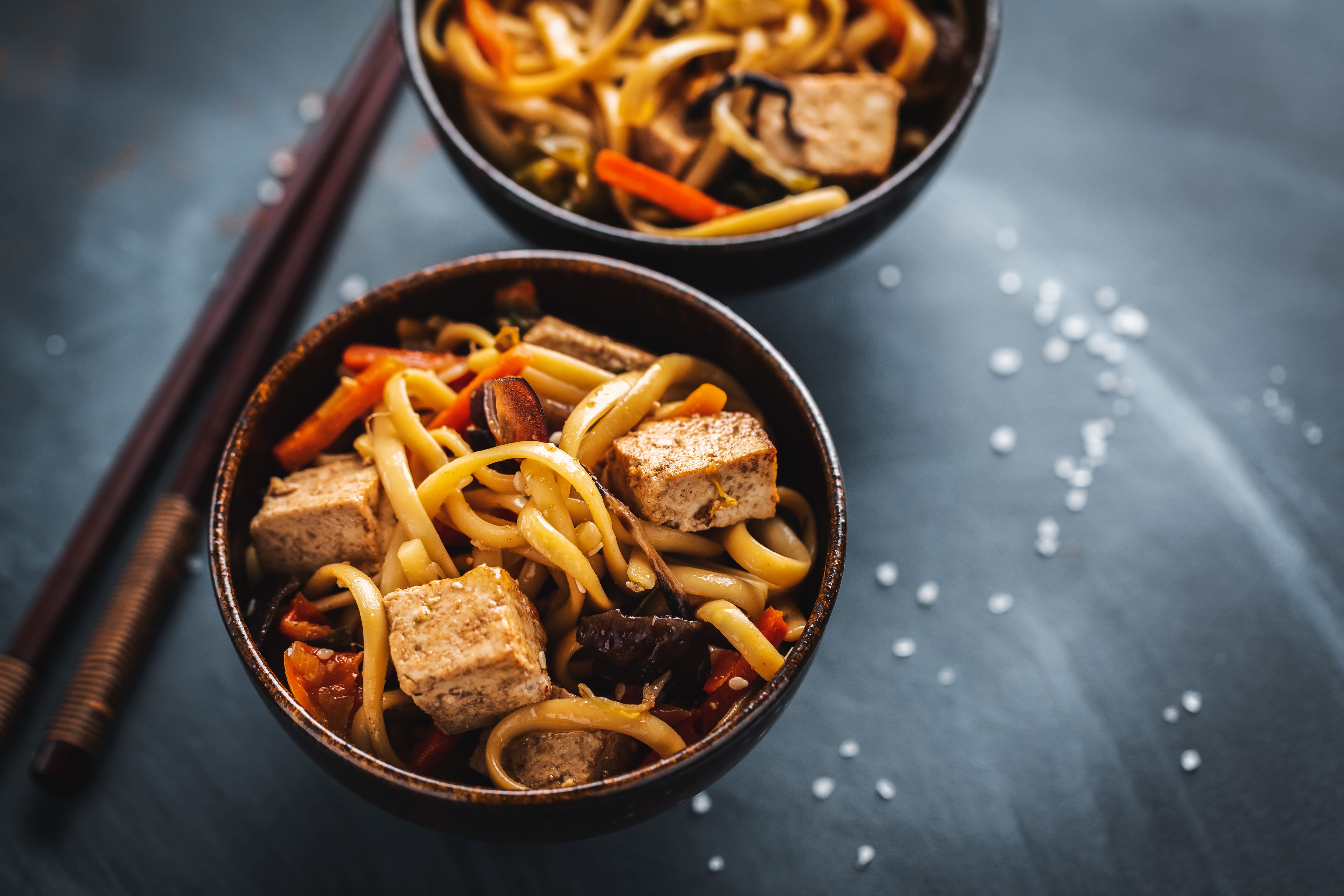tasty-asian-noodles-with-cheese-tofu-vegetables-bowls-min.jpg